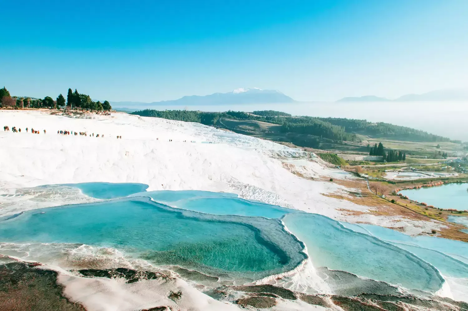 This Destination Was Just Named the Most 'Otherworldly' Magical Place on the Planet for Its Bright Blue Thermal Hot Springs