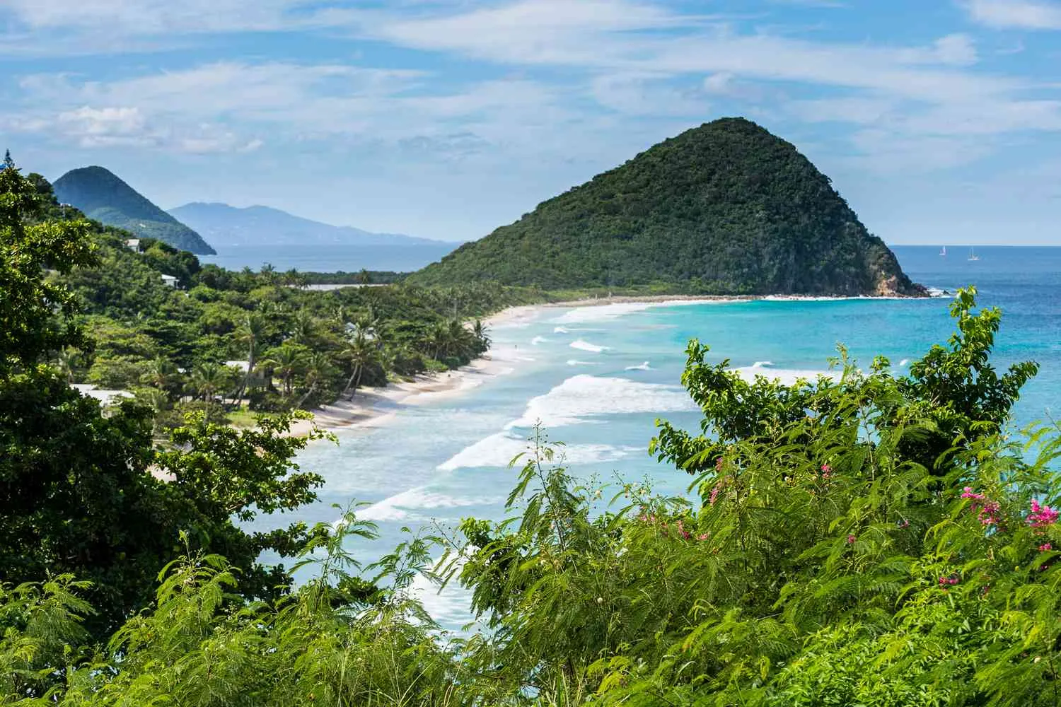 This Caribbean Island Is Home to a Lush National Park, a 400-year-old Distillery, and Stunning White-sand Beaches