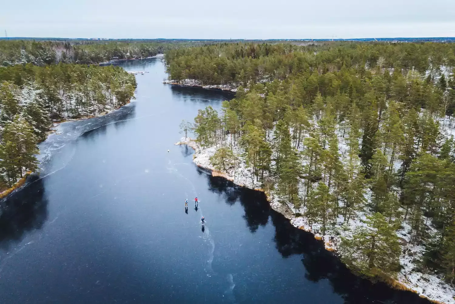 These Swedish Lakes Turn Into a Winter Wonderland Where You Can Skate Past Castles, Cabins, and Pine Trees