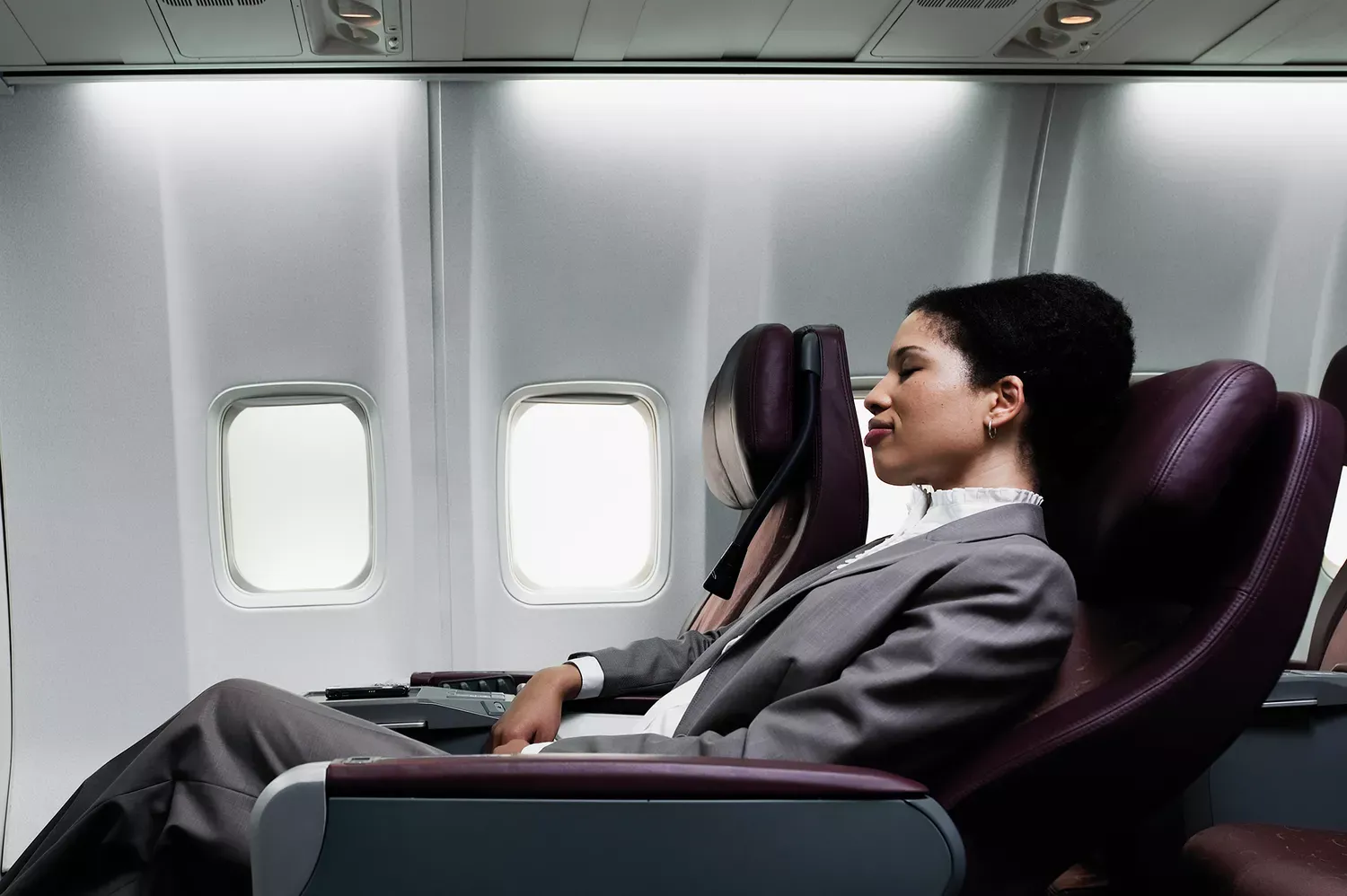 Is It Ever OK to Recline on a Plane? Here's What Experts Say