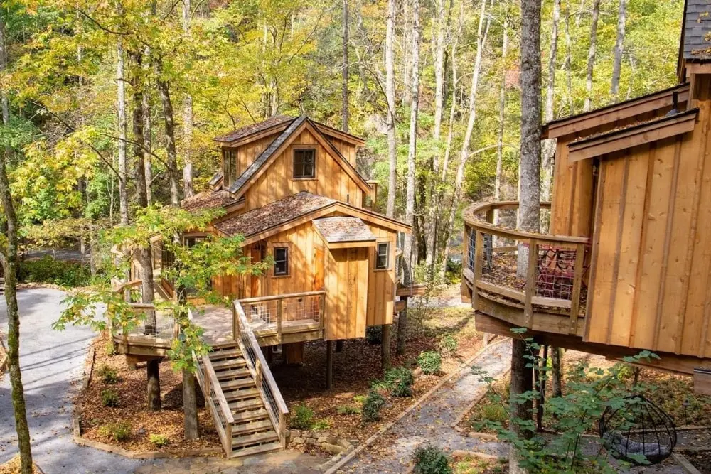 This Small Tennessee Town Just Got a New Tree House Resort — With Private Hiking Trails, Mirror Houses, and Smoky Mountain Views