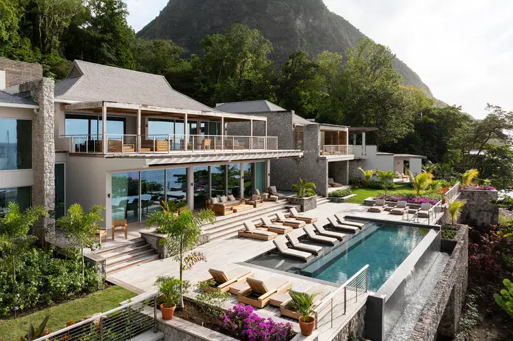 This New Villa in the Caribbean Has Direct Beach Access, an Infinity Pool With Mountain Views, and Museum-worthy Art