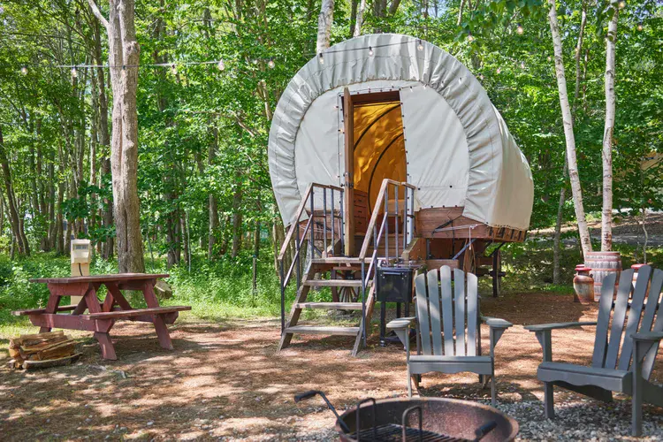 This Campground Brings the Wild West to the East Coast—With Covered Wagons, Fire Pits, and 60 Acres to Explore